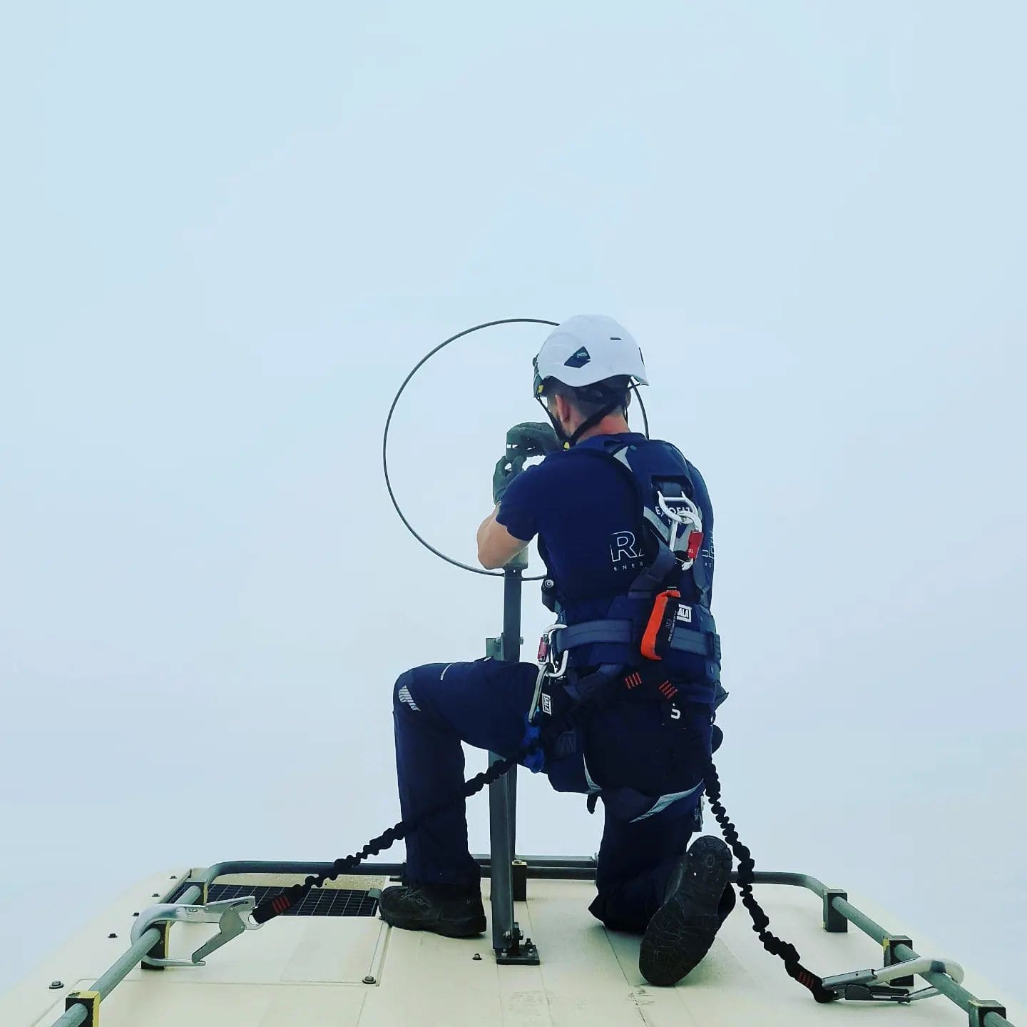 Rafale Energy technicians performing troubleshooting on wind turbines in Germany — industrial corridor